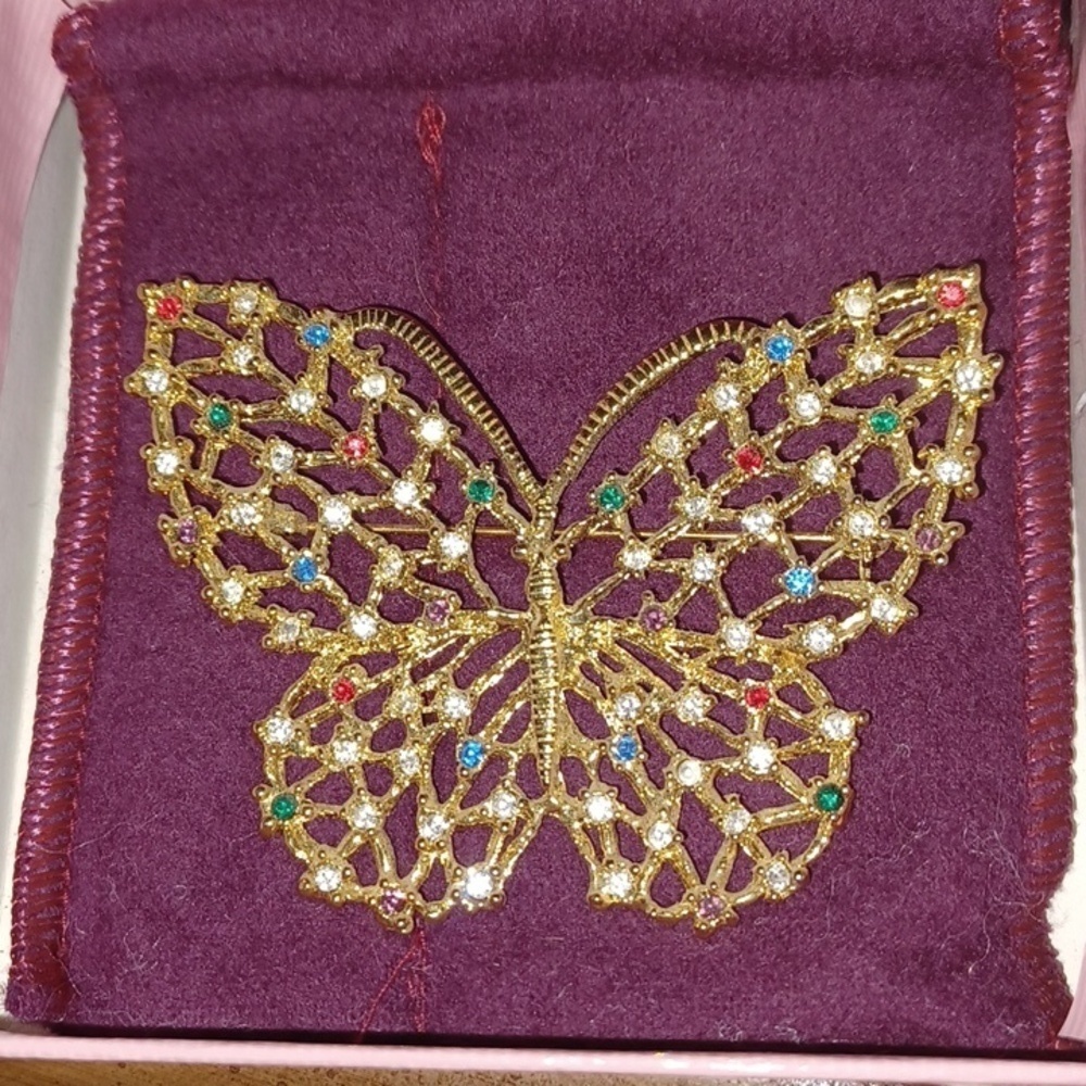 Vintage gold tone filigree rhinestone butterfly brooch, signed, S Lind, 2.5"x2"